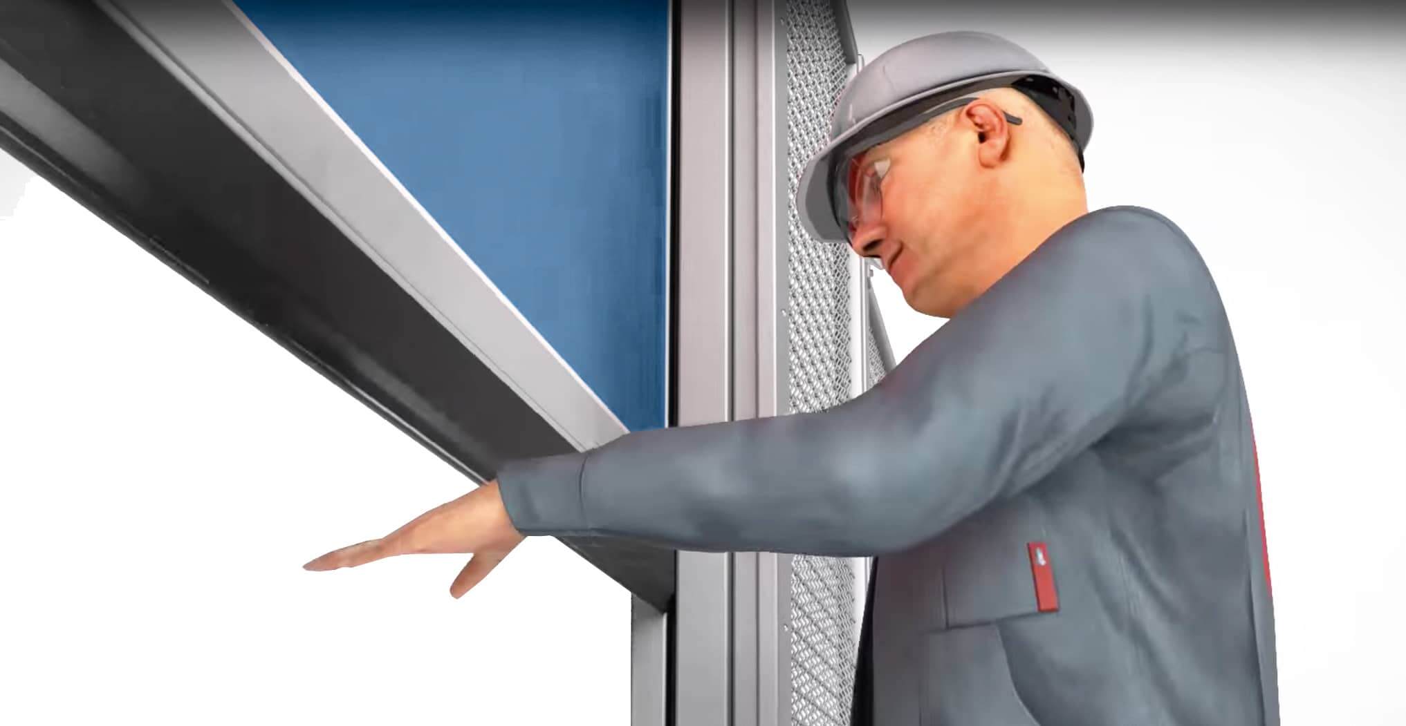 Worker holds hand under security door